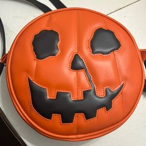 “Halloween” movie pumpkin with the knife-nose, lightly used. Adjustable strap